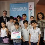 Diana Grigoryan Ghoghanj's Executive Director, Sevan Amirians Paros Foundation Program Manager and children from Ghoghanj mark the official launch of the UITE Engineering Laboratories.