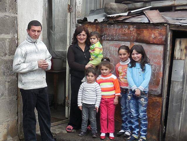 The-Poghosyan-family-before-receiving-their-new-home.