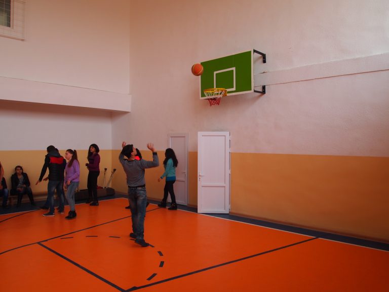 A practice shot prior to gym class at the Hatsik village gym.