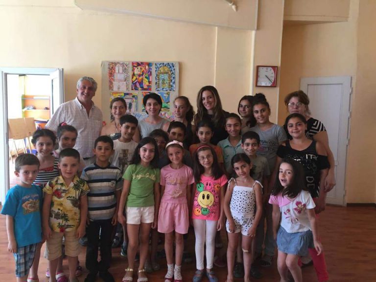Ghoghanj Nor Nork loves hosting guests. Smiling faces welcome Dr. Ani Shabazian, an education specialist, to their center.