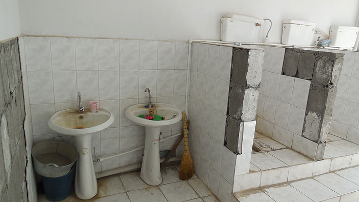 Condition of the Hatsik Village School restrooms before renovation.