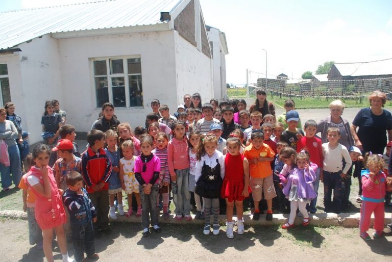 Children gathered in Sisavet Village in the Shirak region waiting for the shoes distributions to begin.