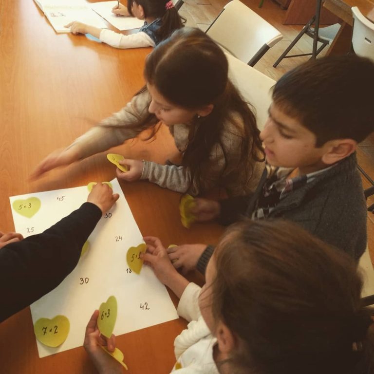 Teachers & volunteers at Debi Arach love to use fun and educational methods while teaching every day subjects like math.