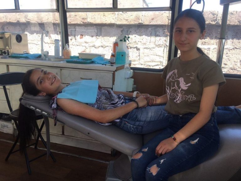 The kids from Debi Arach giving each other moral support !