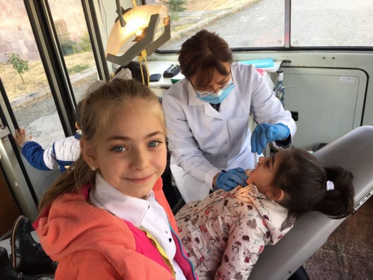 Our dentists on the Mobile Dental Clinic are efficient and gentle with their little patients. Here is a big smile to prove it!
