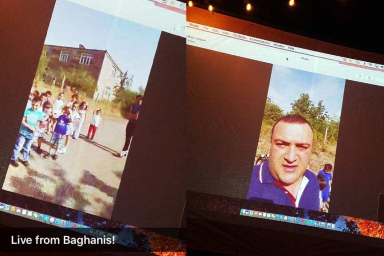 Baghanis Village Leader, Narek Sahakyan, and kindergartners speaking to guests via Skype at the "Evening Under the Stars" fundraiser at the Dunaians' residence.