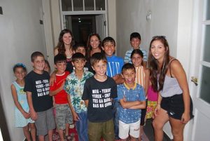 Children at the Gavar Orphanage pose for a photo with share-a-Pair founders while waiting to be fitted for their new shoes.