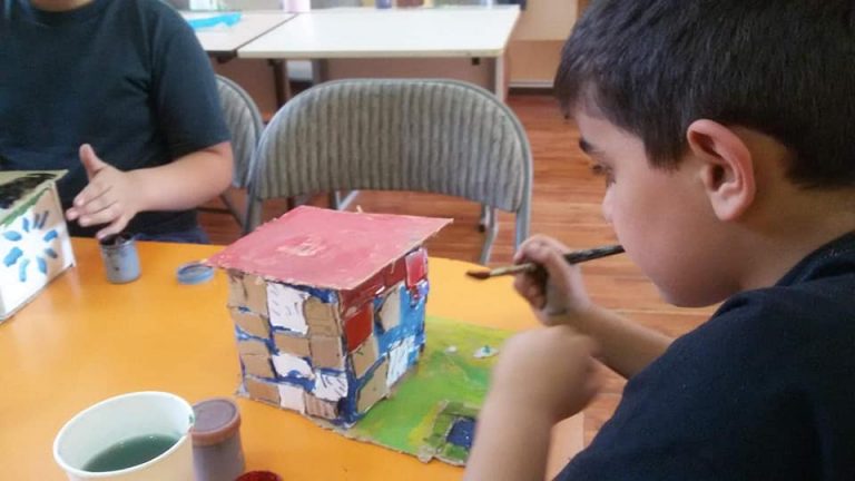 Working on art projects at the Ghoghanj Children's Center.