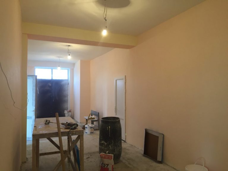 The hallway paint being completed at the Hatsik School.
