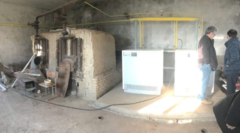 The two new efficient boilers being inspected by Paros Foundation staff.