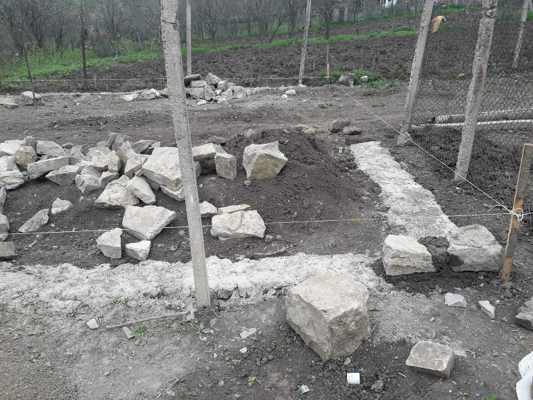 Foundation work on Mher's barn.