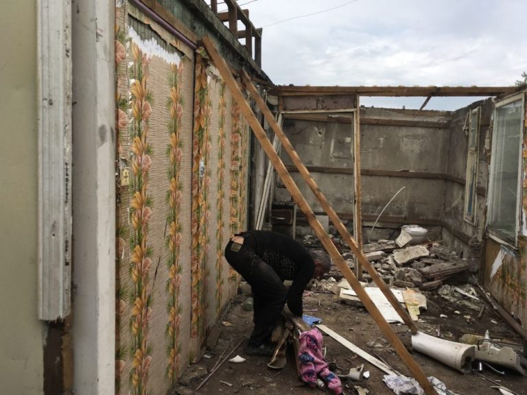 Our friends at the Shirak Center NGO quickly tear down the Karapetyan's old domik to ensure no one will ever live in it again.