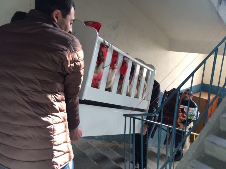 Our friends from the Shirak Center NGO help move the Azizbekyan Family's furniture into their new home.