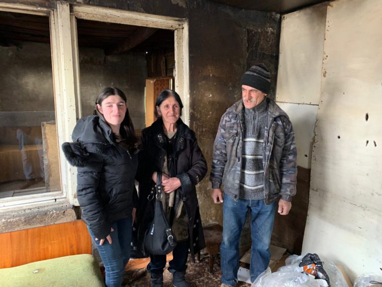 The Yeghiazaryan Family as they leave their old domik for the last time.