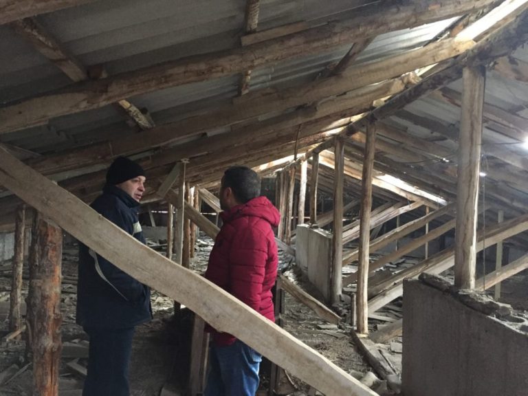 The Paros Foundation construction crew doing a visual inspection of the underside of the roof at the Abovyan School.