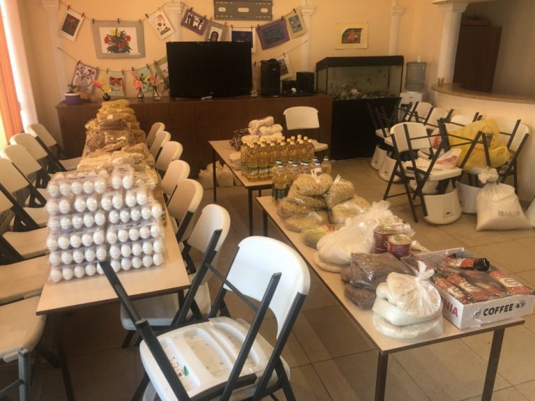 Food packs are being given to Debi Arach families during the COVID-19 closure of the center.