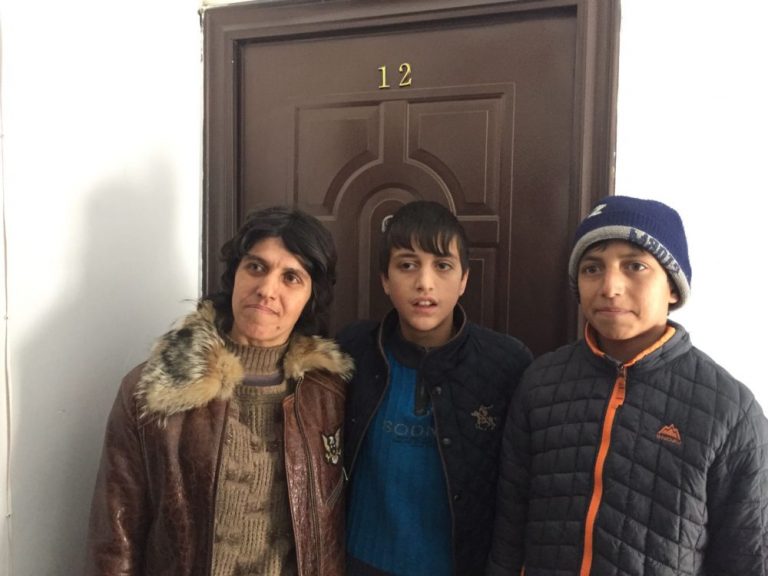 The Yeranosyan family at their new apartment.