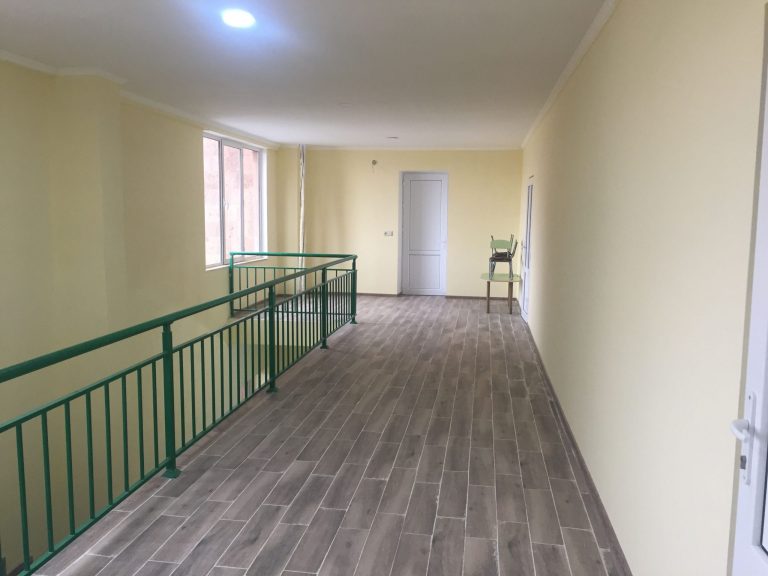 A view of the stairs and hallway leading to the newly renovated auditorium 
and preschool.