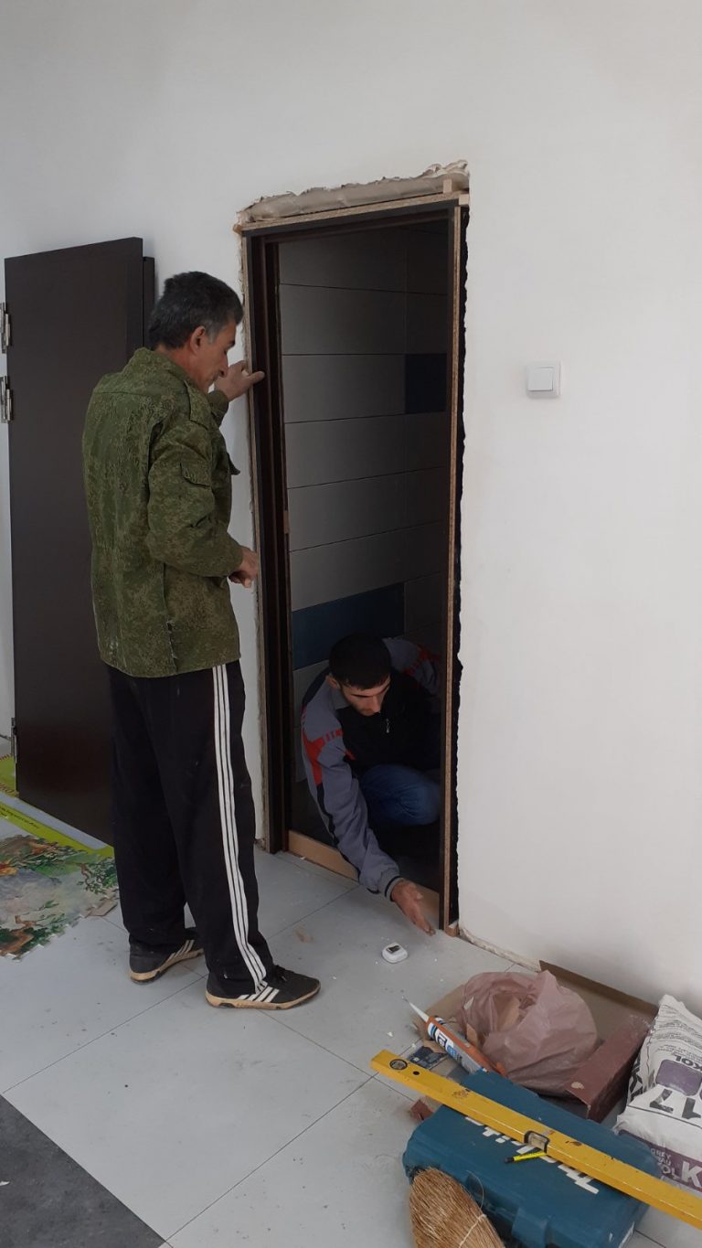 New doors being installed at the school in Nerkin Karmir Aghbyur.