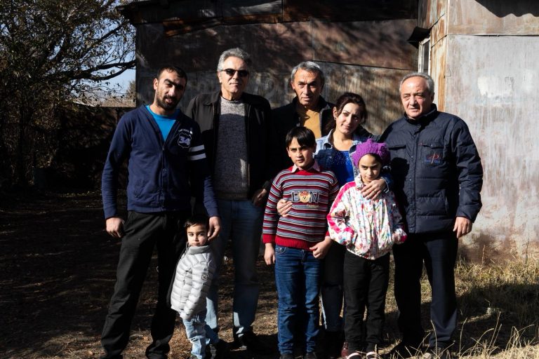 Moving day is here for the Tovamasyan family pictured here with Paros and Shirak Center staff.