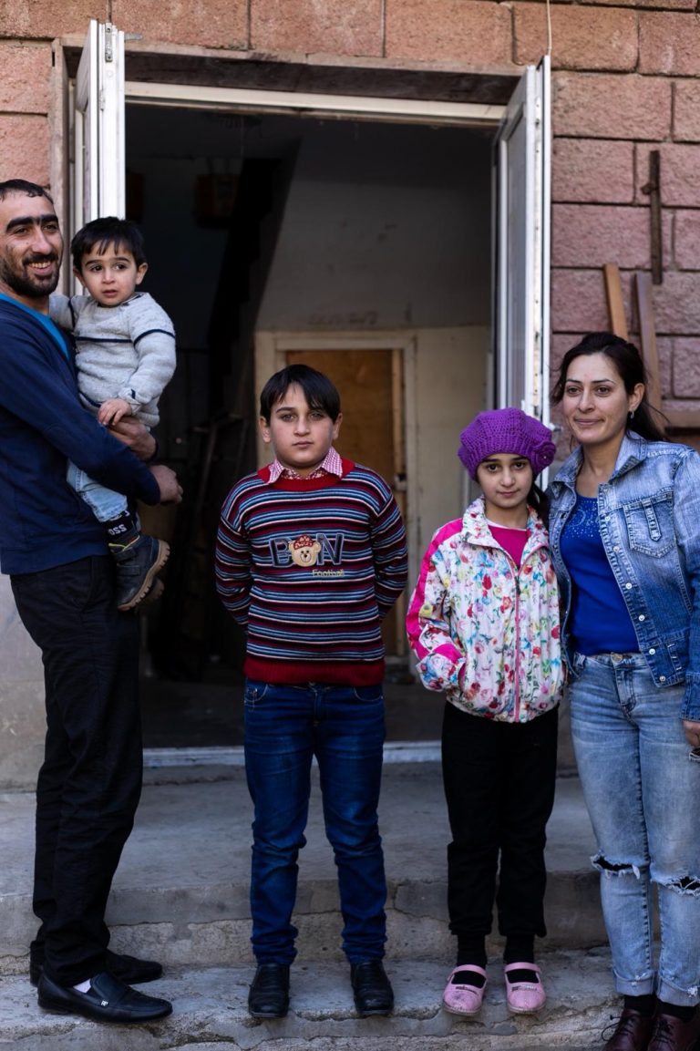 Tovamasyan family ready to enter their new apartment.