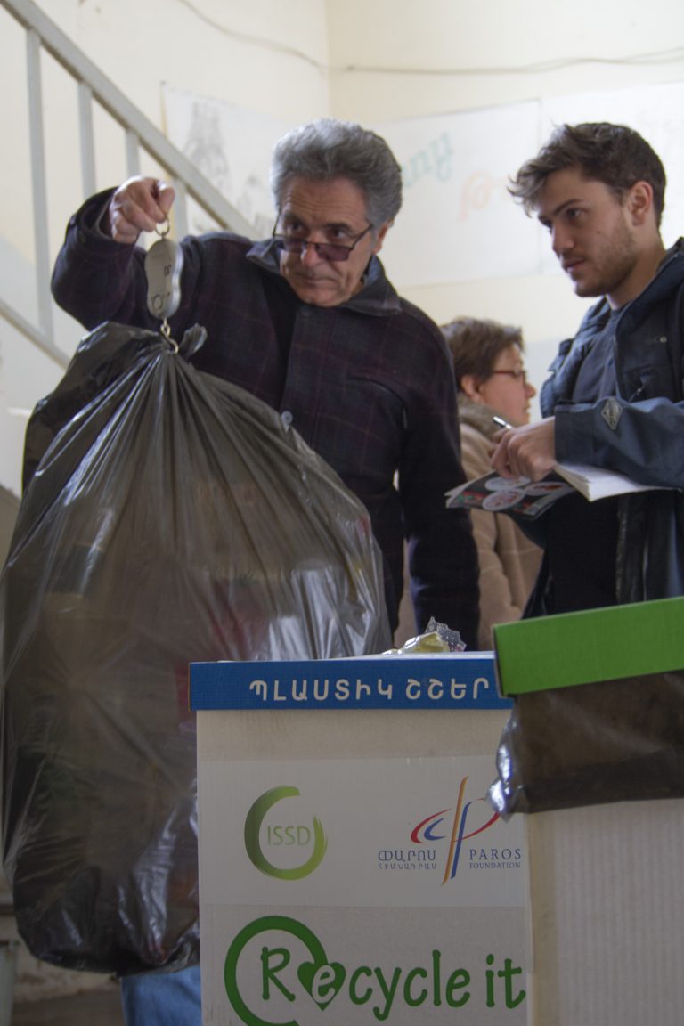 Paros Staff Sevan Amirians and Peter Barsamian weigh and register the recycling materials at each school.