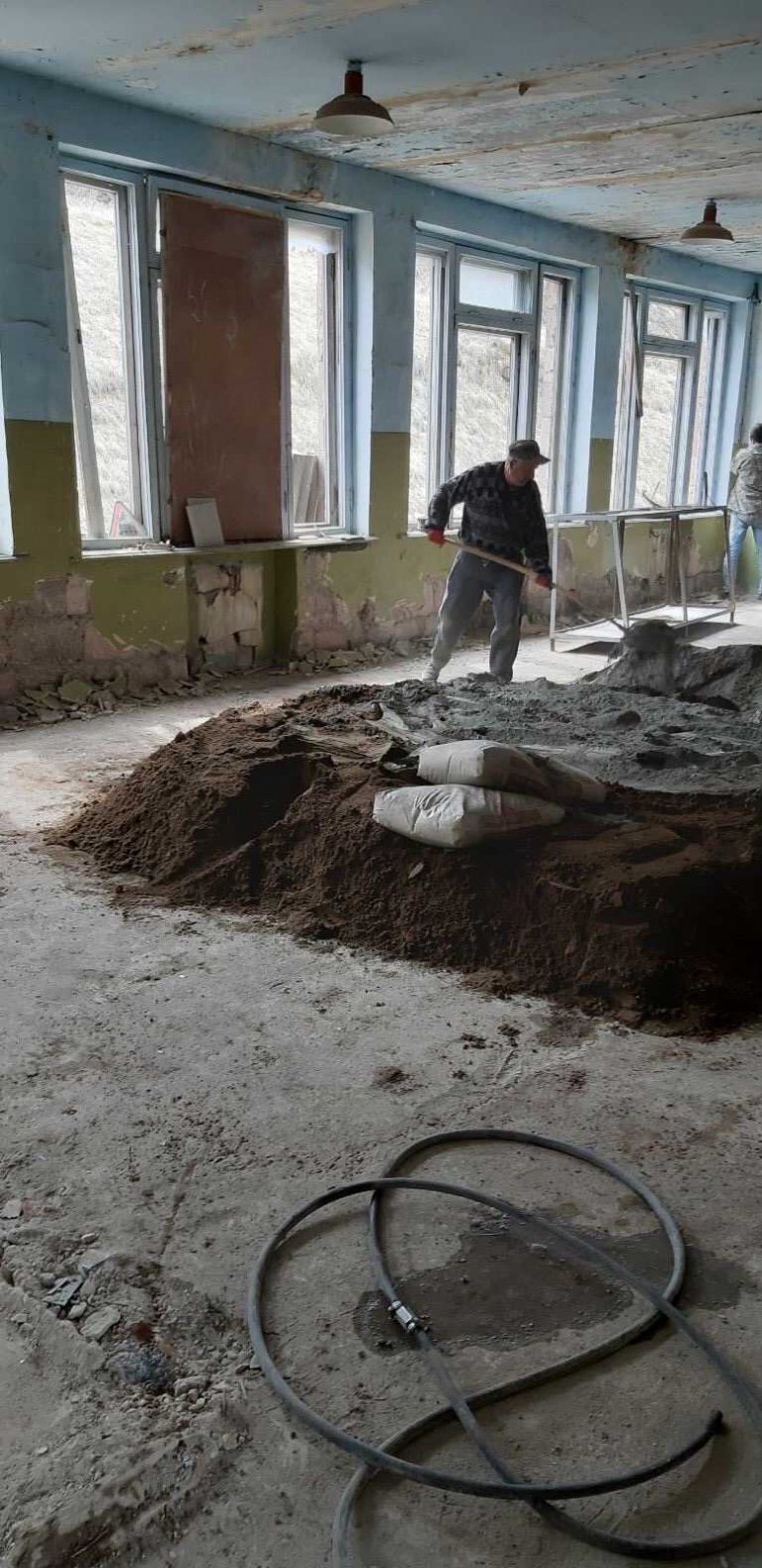 With new windows installed, work on the inside subfloor began at the Artsvabert kindergarten.