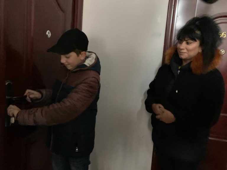Minasyan Family about to walk into their new home.