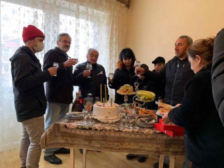 Paros & Shirak staff celebrating with the Minasyan Family.