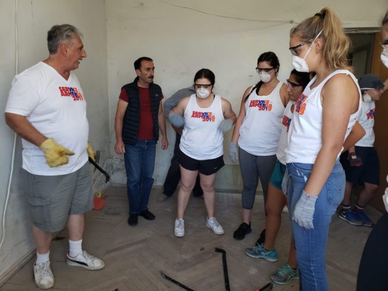 SERVICE Armenia participants helped remove all of the old flooring.