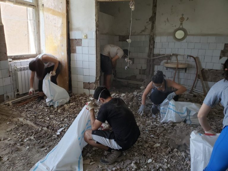 Following demolition, SERVICE Armenia participants removed all the rubble to assist in preparation for the new subfloors.