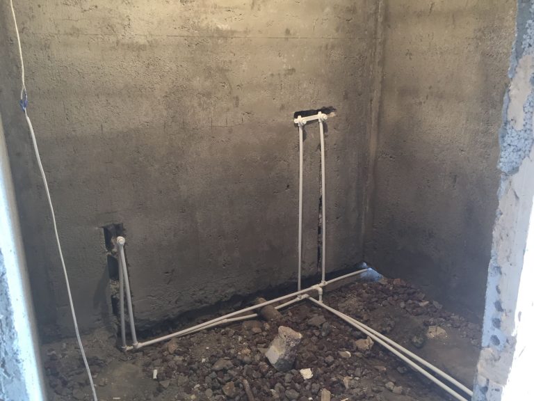 The beginnings of a new interior restroom was built in Emma's home.