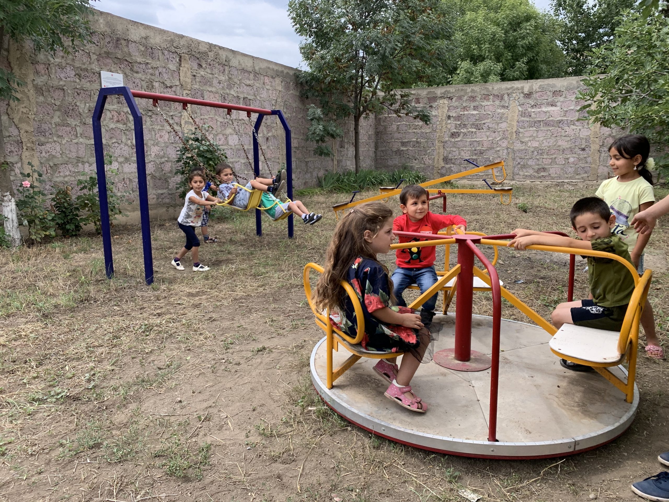 Playing peacefully at the Aygepar Kindergarten playground