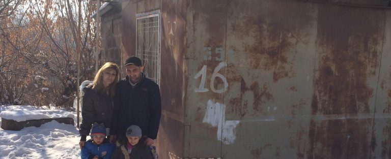 The Mkrtchyan family in front of their old domik.