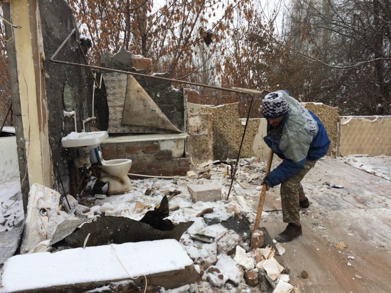 The Shirak Center NGO team hard at work tearing down the Mkrtchyan family's old domik.