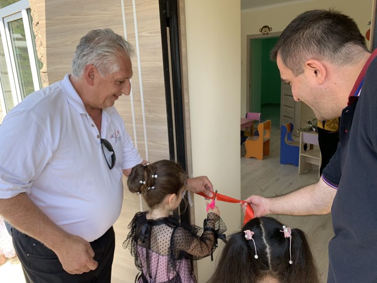 Children cut the ribbon for the newly renovated kindergarten at Aygedzor Village.