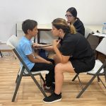 Dr. Sylvia Kotikyan and medical student Julia Seropian conduct wellness screens for children at the Debi Arach Children's Center.