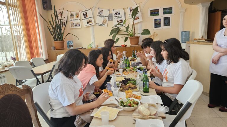 SERVICE Armenia 2026 participants enjoying lunch prepared at Debi Arach